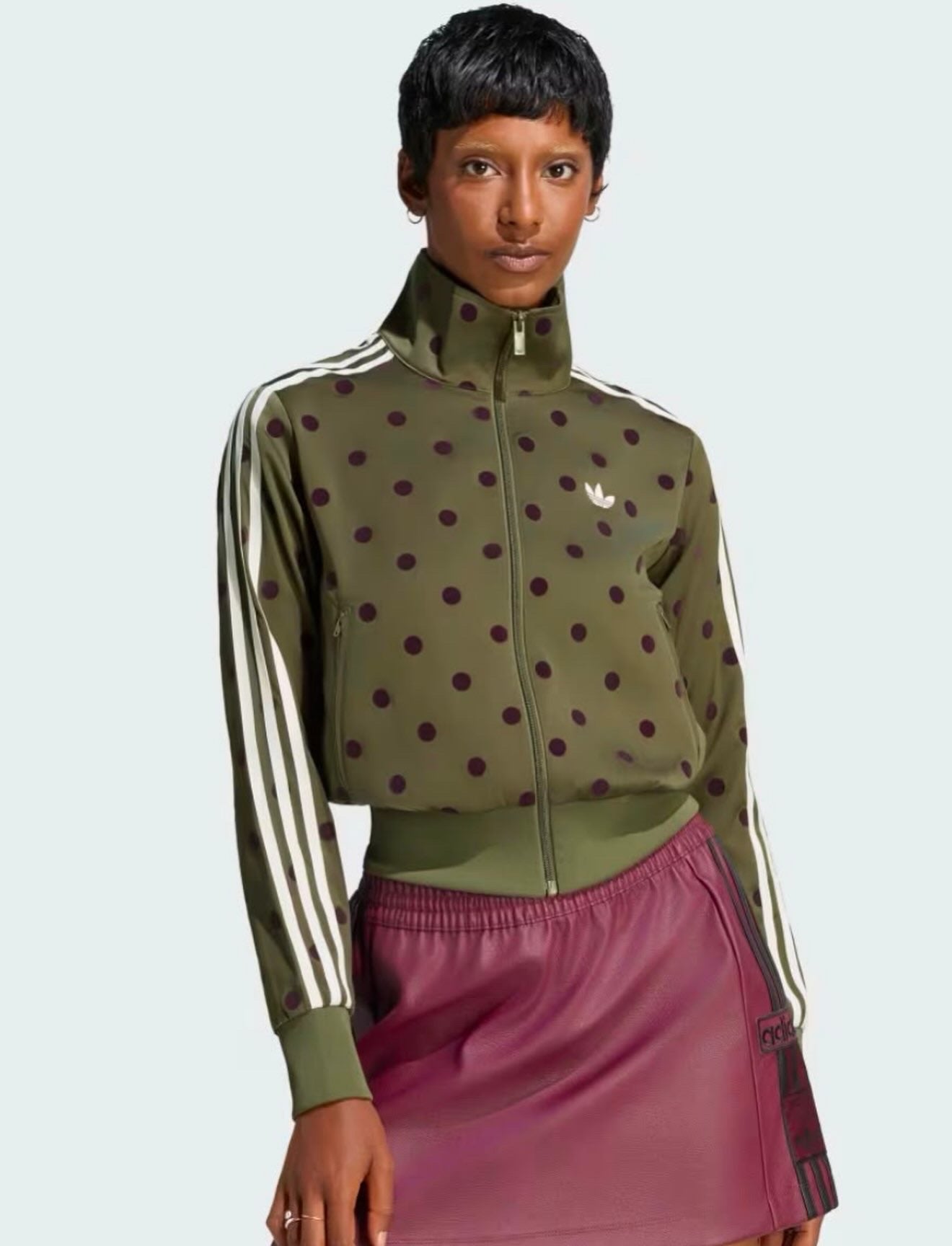 SATIN POLKA DOTS TT TRACK TOP
Standard fit track top with zipper closure for versatile styling adidas