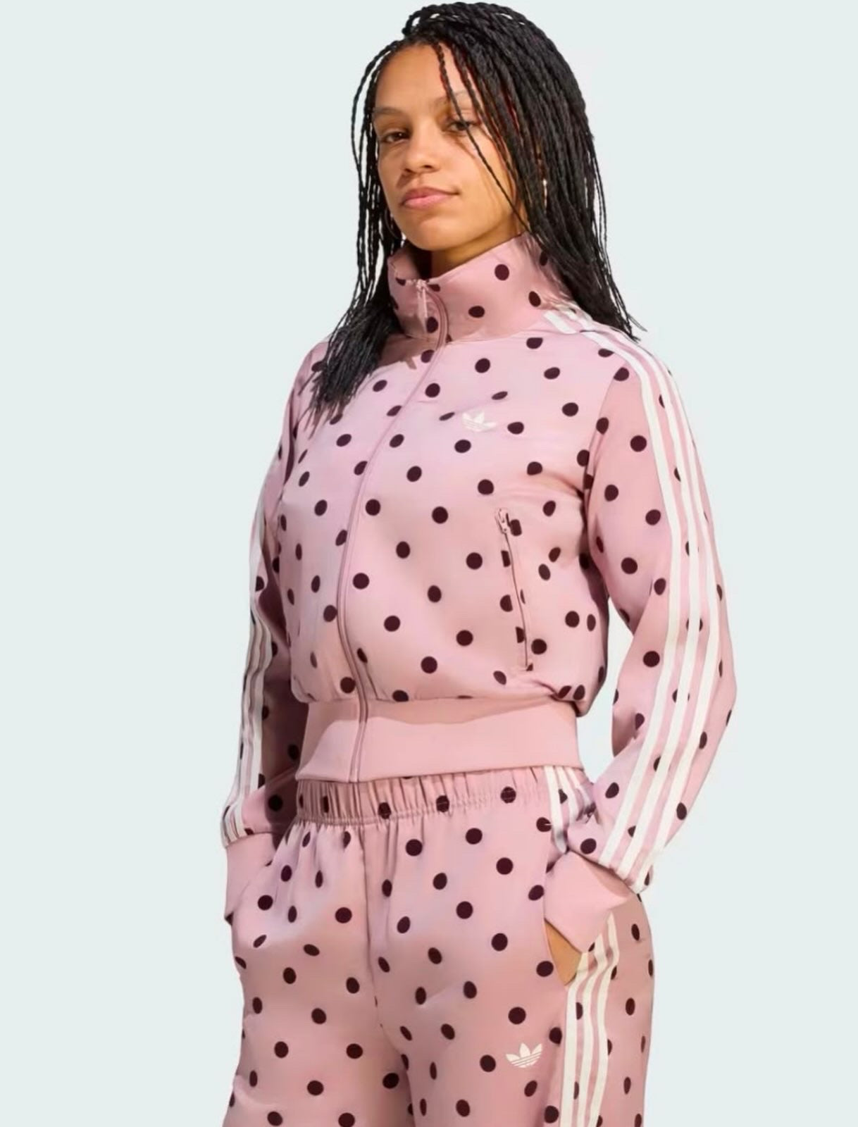 SATIN POLKA DOTS TT TRACK TOP
Standard fit track top with zipper closure for versatile styling adidas
