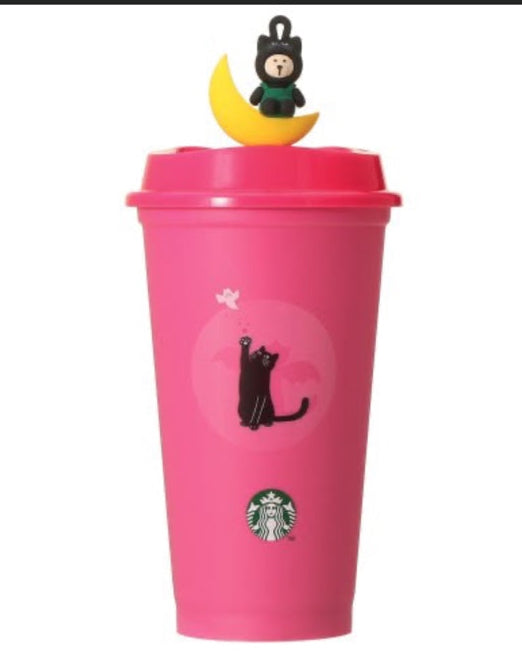 Starbucks vaso rosa con tapa y Bearista sobre luna